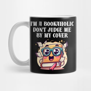 I'm a bookaholic. Don't judge me by my cover! Mug